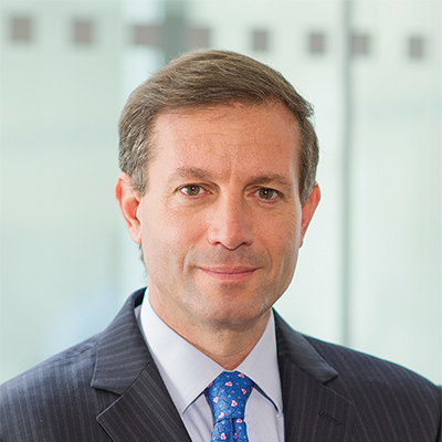 Headshot of Craig Abouchar smiling at the camera