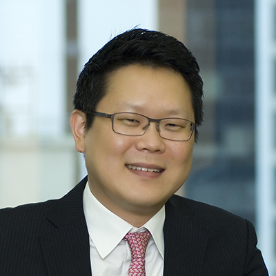 Headshot of Chun Song smiling at the camera.